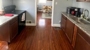 Coffee/tea maker, fridge, microwave, oven