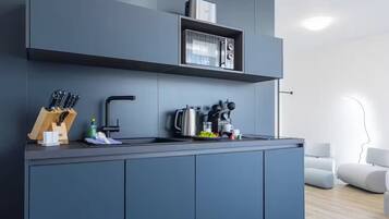 Mini-fridge, microwave, stovetop, dishwasher