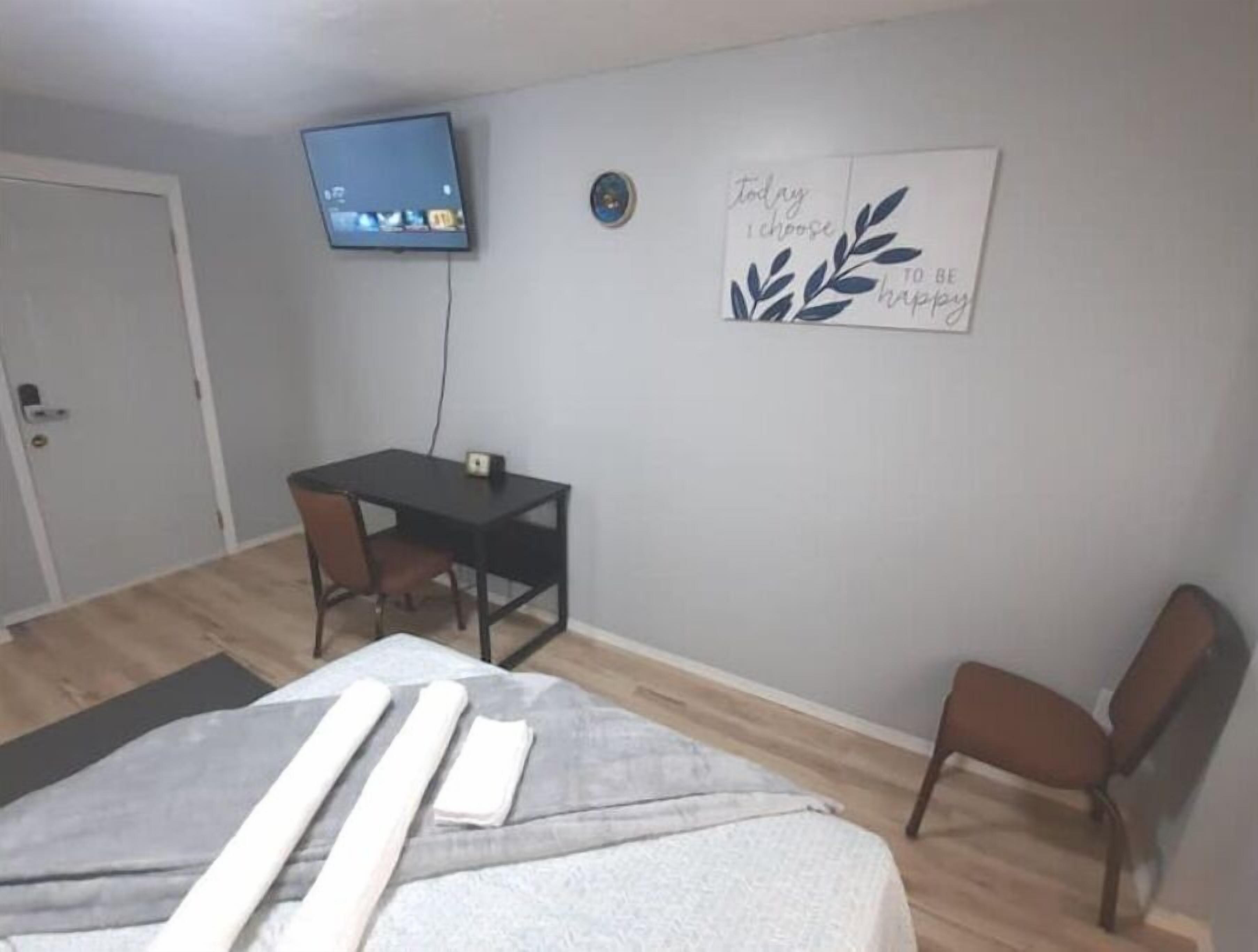 1 slaapkamer, een strijkplank/strijkijzer, gratis wifi, beddengoed