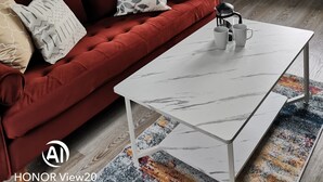 A modern living room with a red sofa, white coffee table, and a mirror on the wall. - Comfortable 3 BR with parking-WS2 for contractors, professionals and families
 (Walsall)