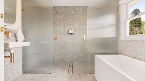 Bathtub, hair dryer, towels