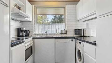 Een koelkast, een oven, een vaatwasser