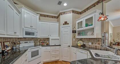 Peaceful, quiet, friendly, seconds from dining, shopping, schools, and commute.