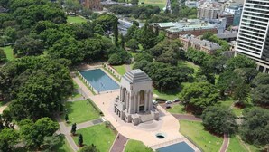 A large, historic building with a central dome and a surrounding courtyard with a pool and pathways. - Stylish Warehouse Oasis in Vibrant Darlinghurst (Darlinghurst)