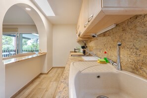 Bathtub, hair dryer, towels