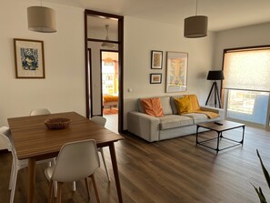 TV, fireplace - Holiday Apartment "Onda Beach House" with Sea View, Shared Pool & Wi-Fi (Cortegaça)