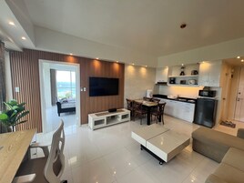 Panoramic Apartment, Sea View | Living area | 55-inch Smart TV with digital channels, Netflix, streaming services