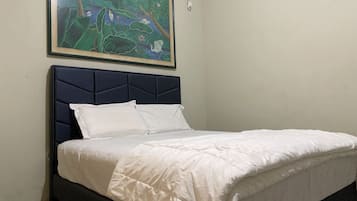 Kamar Double Basic | Wi-Fi gratis dan seprai linen