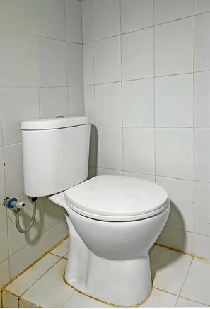 Economy Double Room | Bathroom | Shower, soap