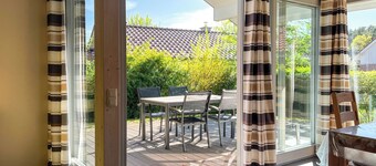 Ferienhaus Wiesengeflüster W3 mit Fasssauna und Garten, 300 m zur Müritz