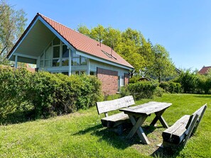 Escape to a serene retreat surrounded by lush greenery and a peaceful atmosphere.
