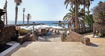Vacation Apartment 'Playa Flamingo 19' with Sea View, Shared Pool and Private Terrace