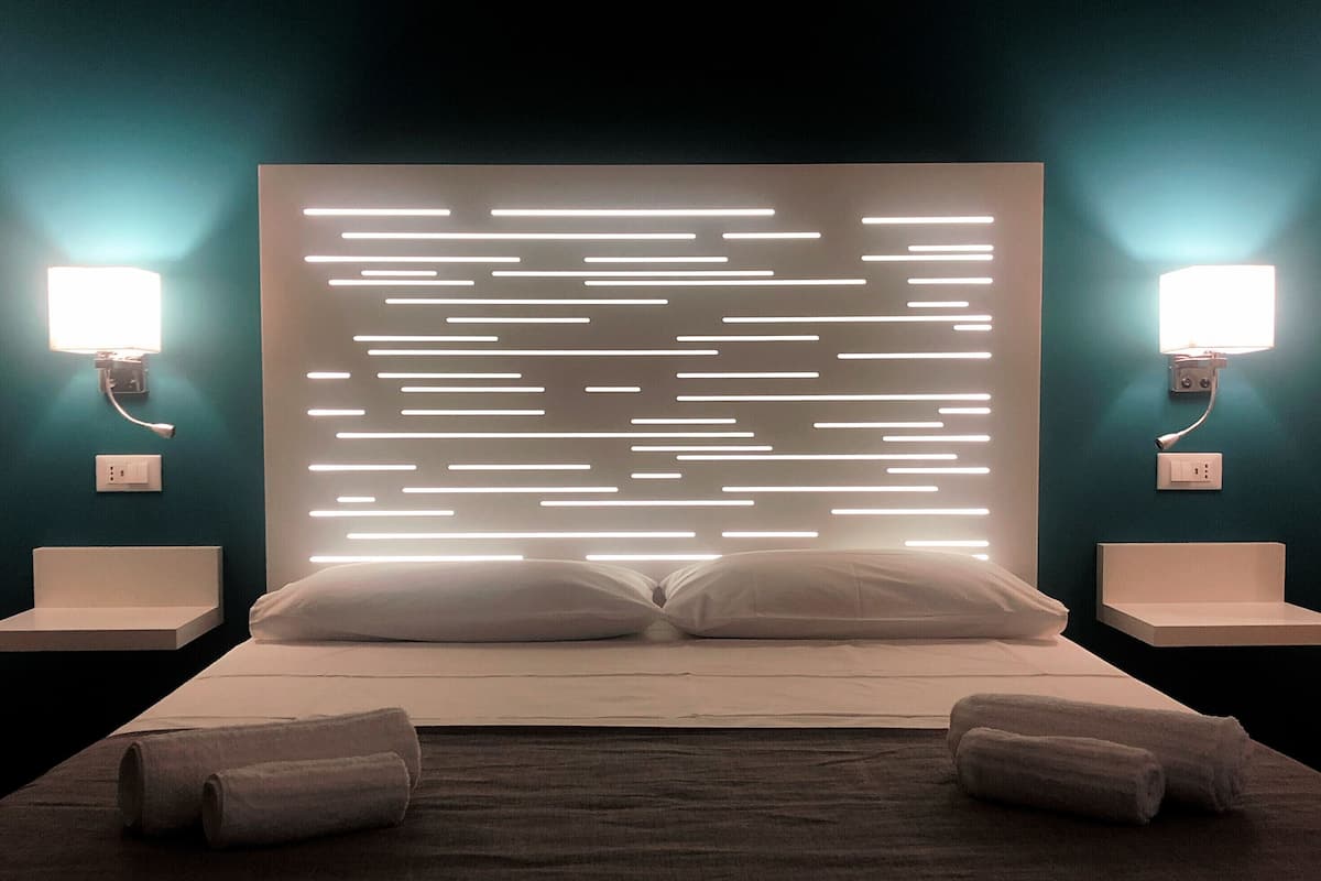 Deluxe Double Room, 1 Bedroom, Ensuite, City View | In-room safe, soundproofing, iron/ironing board (on request), free WiFi