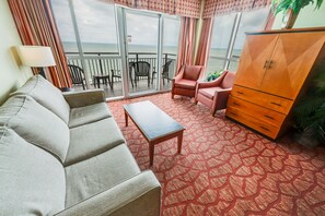 Enjoy the ocean view from the balcony through the large sliding glass door.