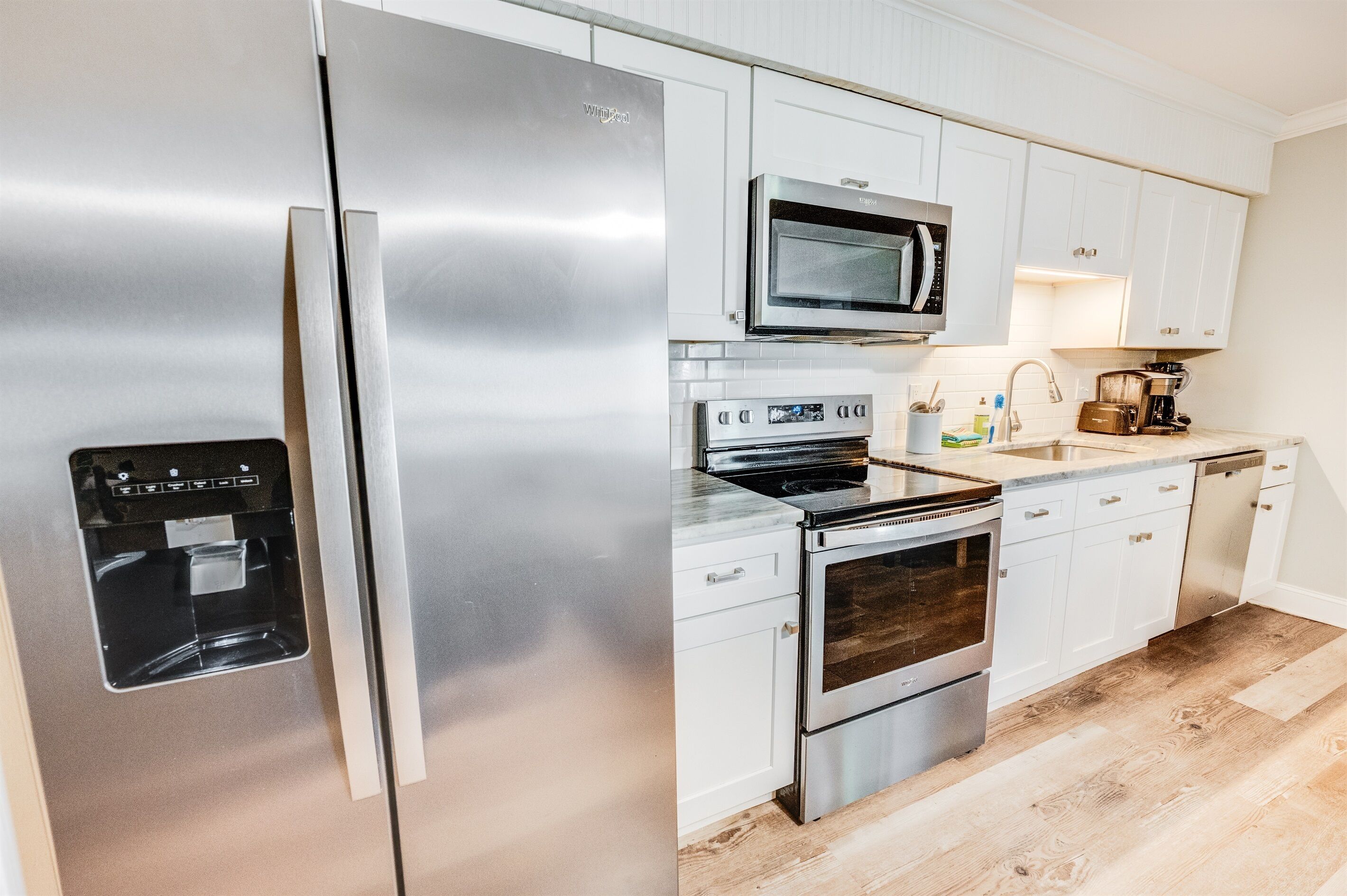 Fridge, microwave, coffee/tea maker, toaster