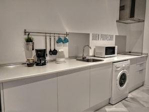 Fridge, microwave, stovetop, coffee/tea maker