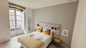 1 quarto, ferros/tábuas de passar roupa