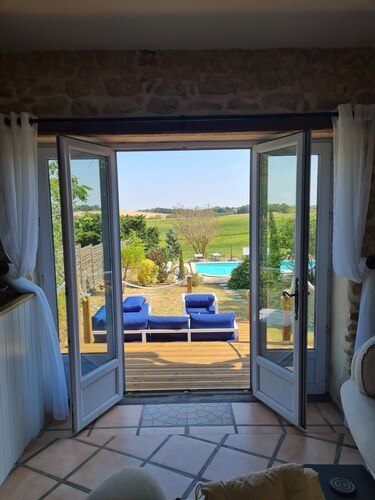 Large luxurious house with heated pool & stunning views in a picturesque village