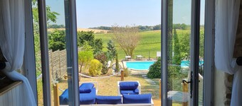 Large luxurious house with heated pool & stunning views in a picturesque village