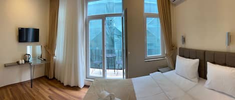 Chambre Deluxe, 1 trÚs grand lit, non-fumeurs | Literie de qualité supérieure, couette en duvet d'oie