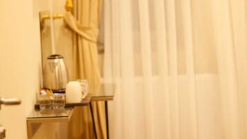 Premium bedding, down duvets, Select Comfort beds, in-room safe