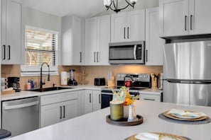 Fridge, microwave, oven, stovetop