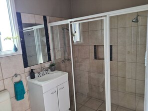 Hair dryer, towels, soap, shampoo