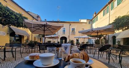 house with UNESCO monuments view: San Vitale, Galla Placidia