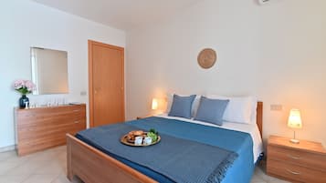 Apartamento básico | 2 quartos, cortinas blackout, ferros/tábuas de passar roupa