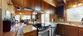 Dog-friendly cabin with fireplace, deck, mountain views, & W/D