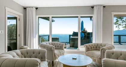 Luxury home with spectacular view, hot tub, decks, rec room, & yoga space