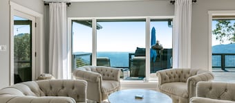 Luxury home with spectacular view, hot tub, decks, rec room, & yoga space