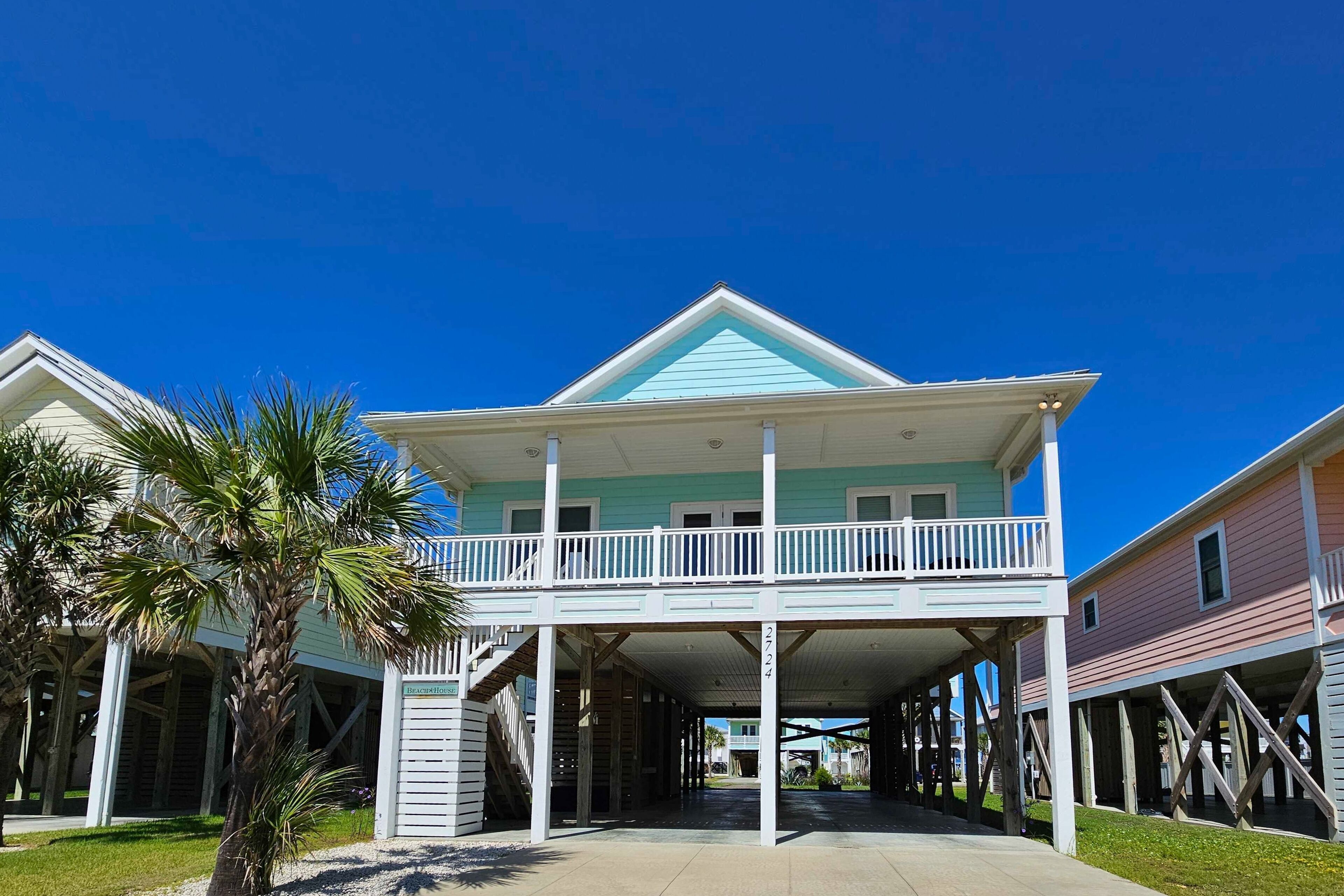 Dog-friendly 2nd-row home with beach views, deck, outdoor shower, & wagon
