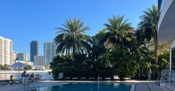 Pool - Luxury 1BR Retreat: Beach Access, Pool Over Canal & Full Amenities (Hallandale Beach)