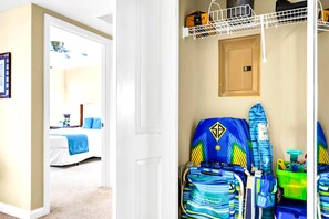 Complimentary beach gear located in the entry closet, with a tidy space that makes coming and going from the beach feel easy.
