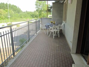 Apartment, 2 Bedrooms, Balcony, Garden View | Balcony - Comfort With Terrace at Grado Pineta (Grado)