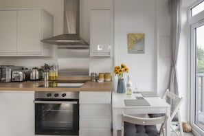 Fridge, dishwasher, electric kettle, toaster
