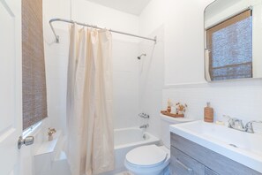Hair dryer, towels, soap, toilet paper