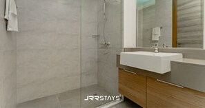 Hair dryer, towels, soap, toilet paper - JVC Bloom Towers Studio w Balcony, Wi-Fi, Sleeps 2 - JRR Stays
 (Dubai)