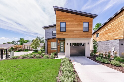 Stunning New 3 Story 5 bed 3.5 bath Home situated in the best location in SLC