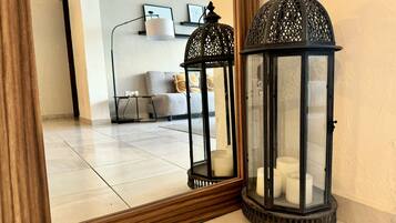 Family Apartment | Living area | 50-inch flat-screen TV with digital channels