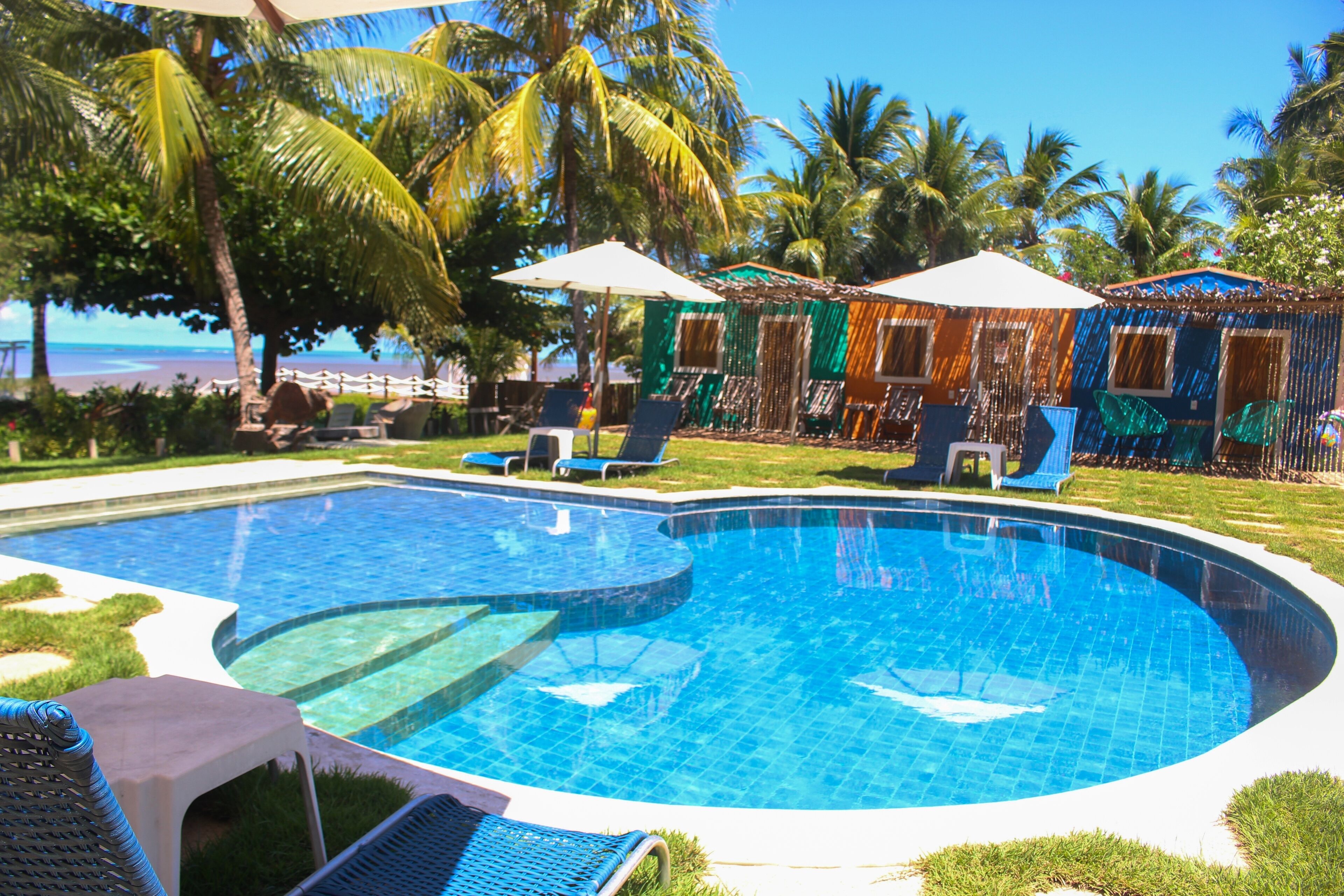 Outdoor pool, pool umbrellas, sun loungers
