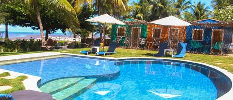 Outdoor pool, pool umbrellas, sun loungers