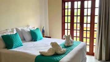 Quarto, vista para o mar, no piso térreo | Frigobar, Wi-Fi de cortesia, roupa de cama