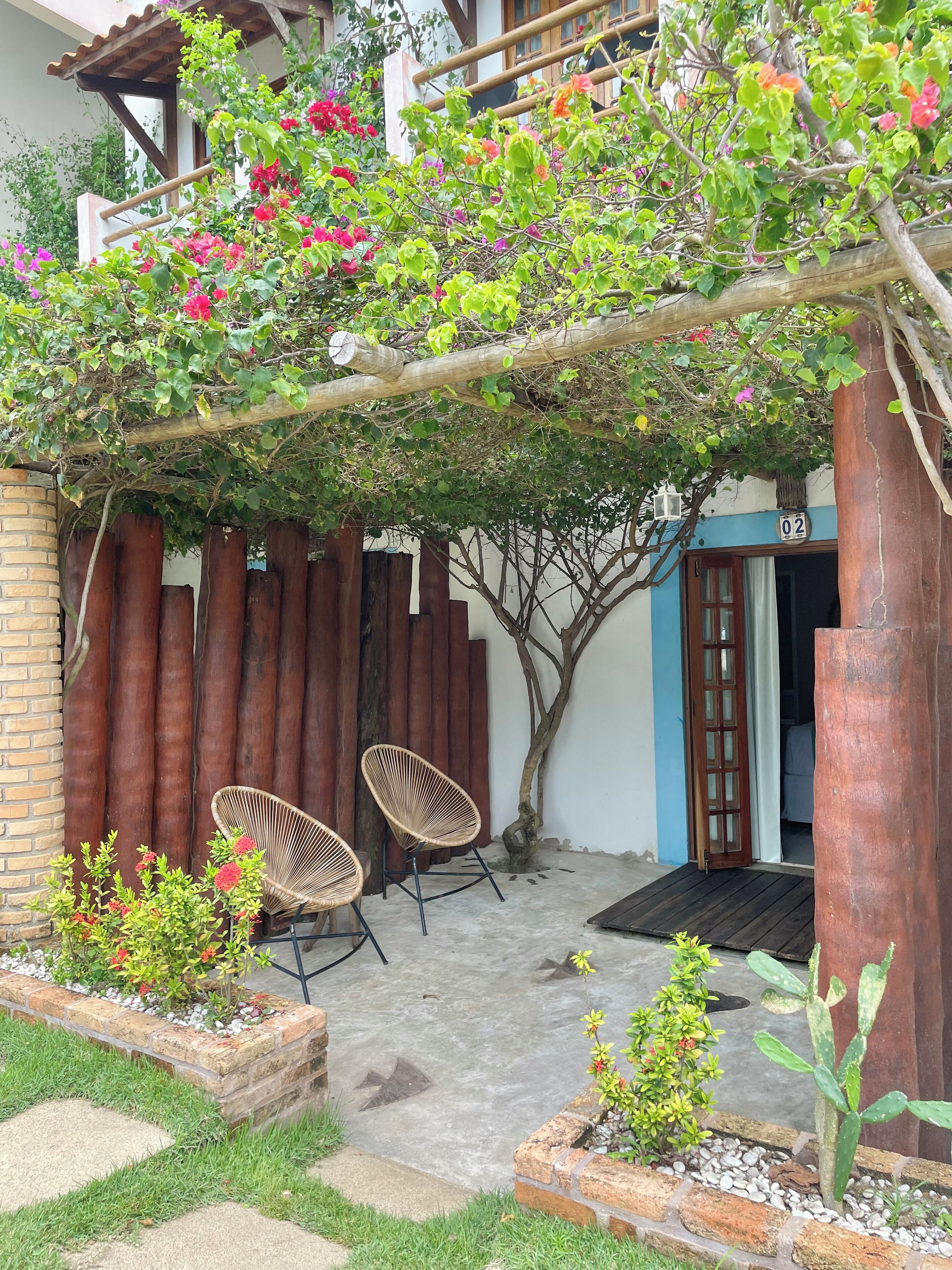 Habitación, vistas al mar, planta baja | Patio hawaiano