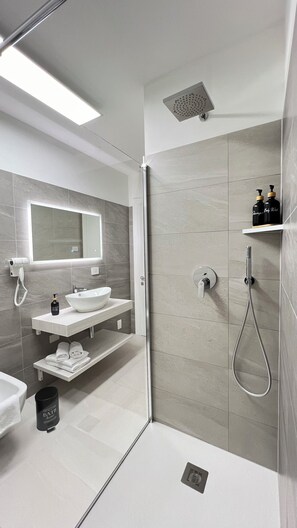 Shower, eco-friendly toiletries, hair dryer, bathrobes