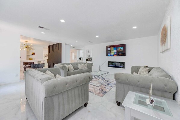 Smart TV, fireplace, books