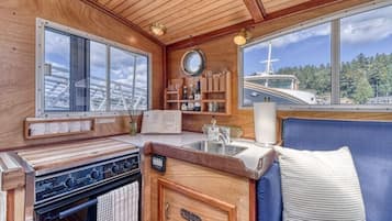 Fridge, microwave, oven, dining tables