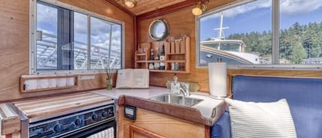 Fridge, microwave, oven, dining tables
