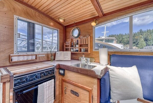 Fridge, microwave, oven, dining tables